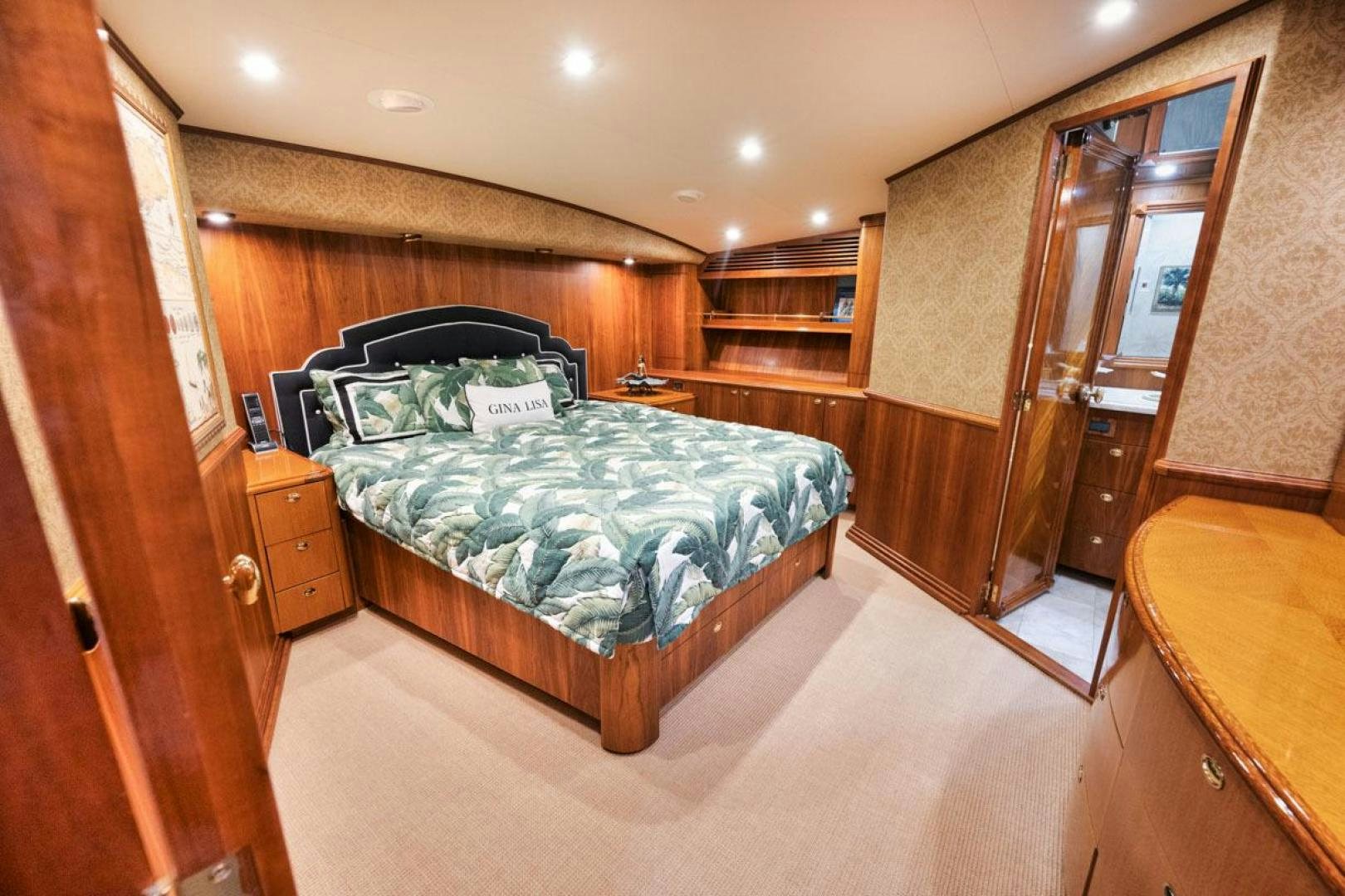 a bed in a room aboard Gina Lisa Yacht for Sale