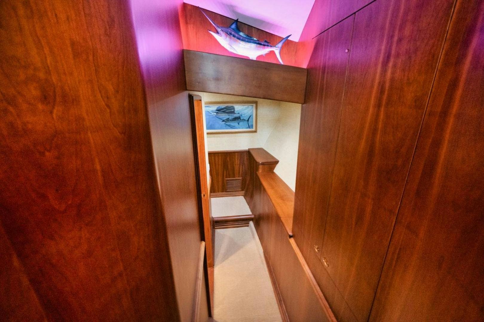 a wooden floor with a wood cabinet aboard Gina Lisa Yacht for Sale