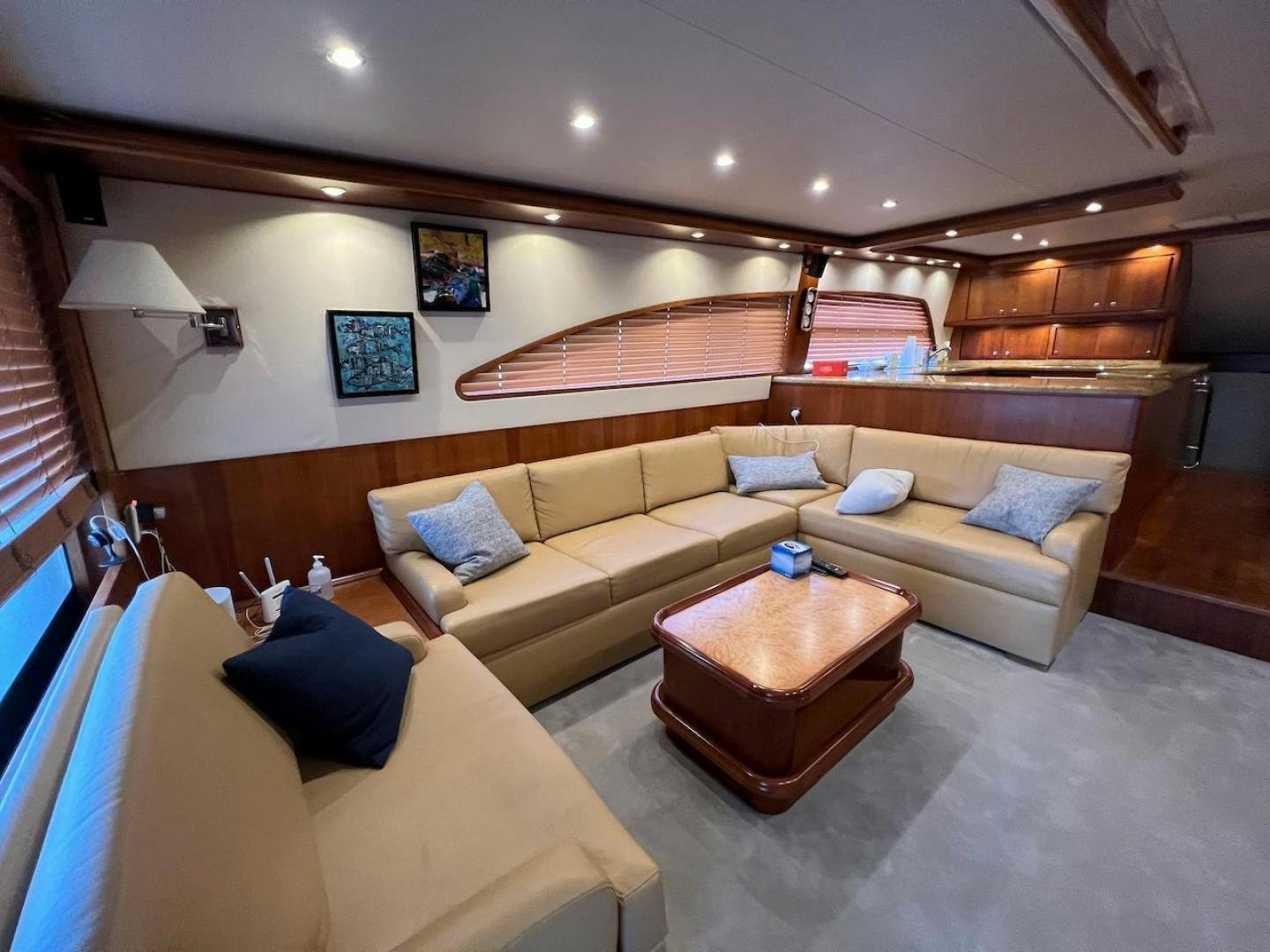 a living room with a couch and a table aboard ROFO Yacht for Sale