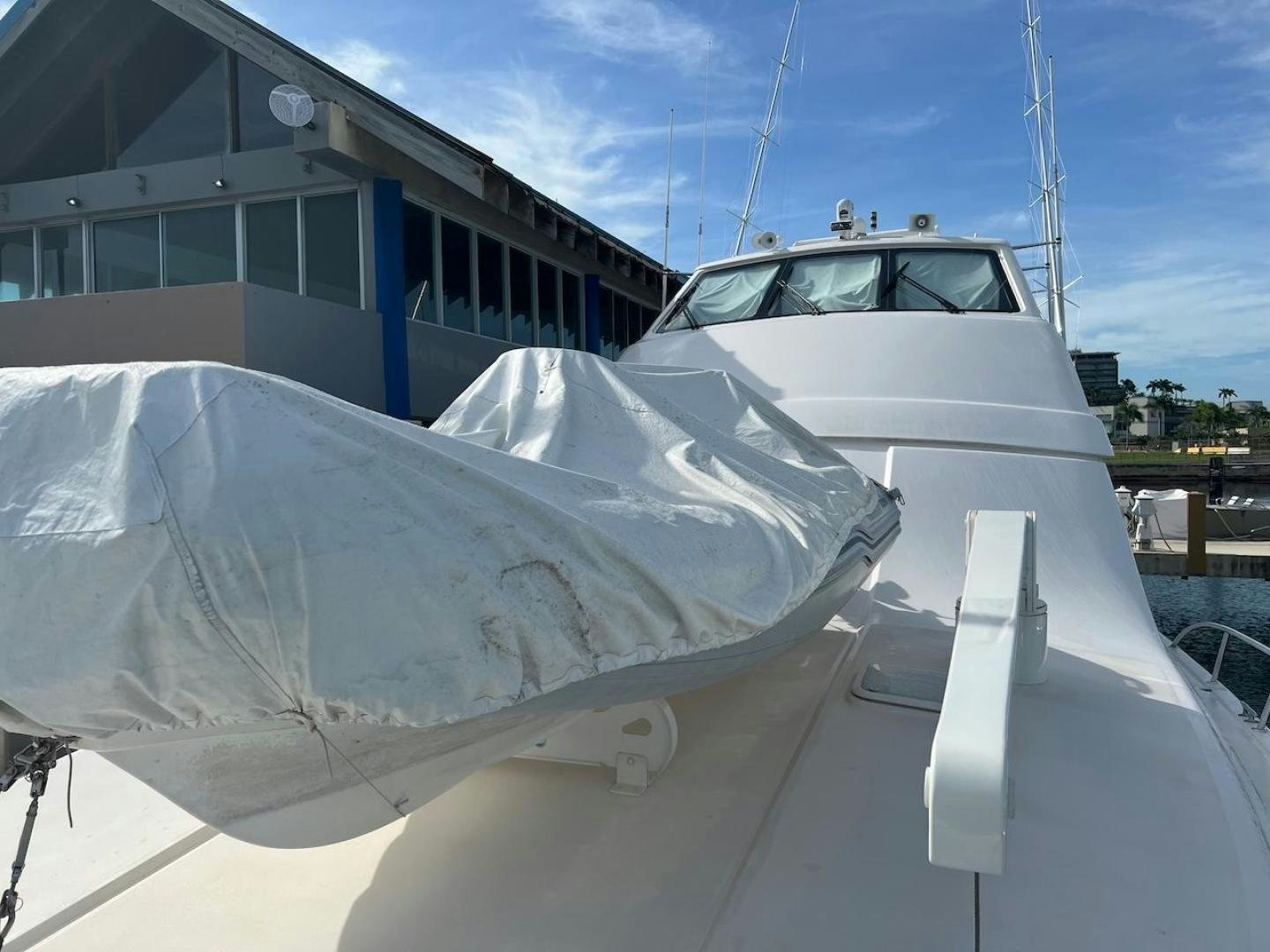 a white car with a hood open aboard ROFO Yacht for Sale