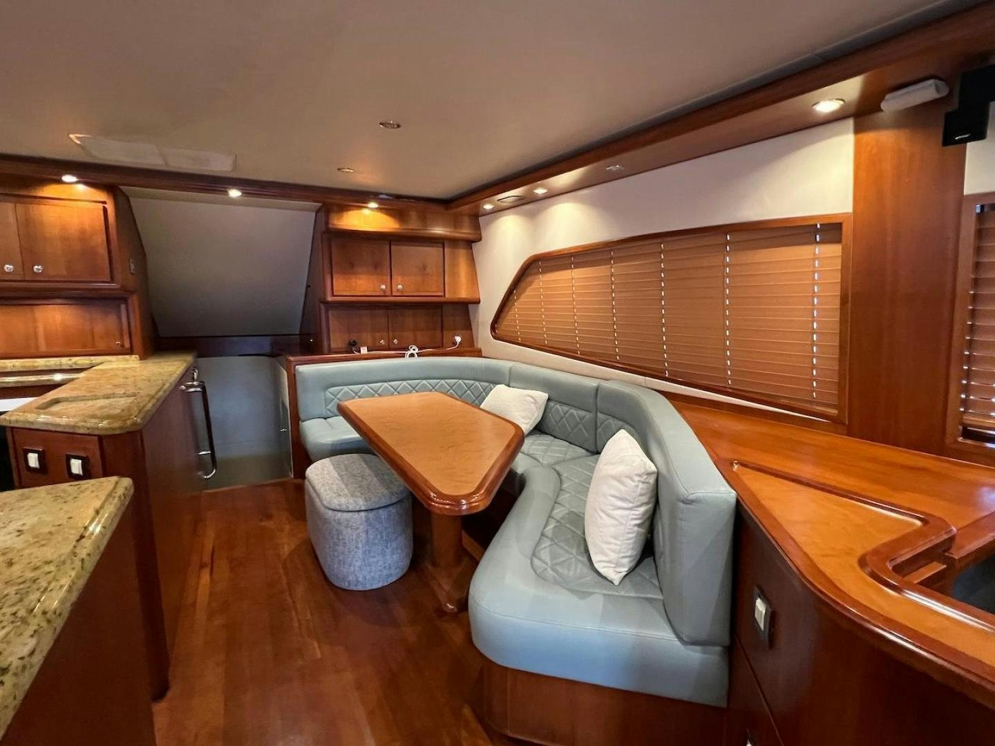 a kitchen with a couch and a sink aboard ROFO Yacht for Sale