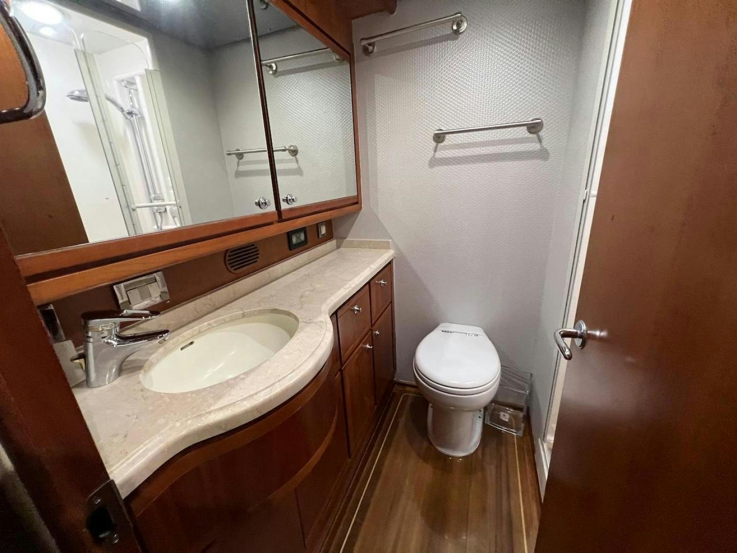 a bathroom with a sink and toilet aboard ROFO Yacht for Sale