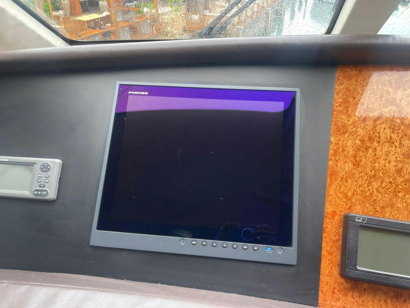 a tv on a shelf aboard ROFO Yacht for Sale