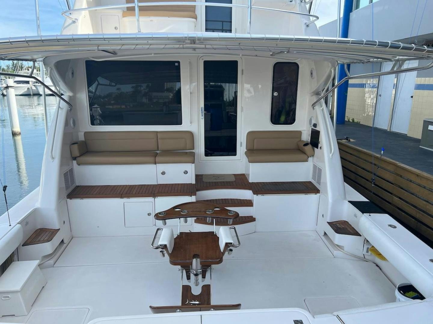 a room with a table and chairs aboard ROFO Yacht for Sale