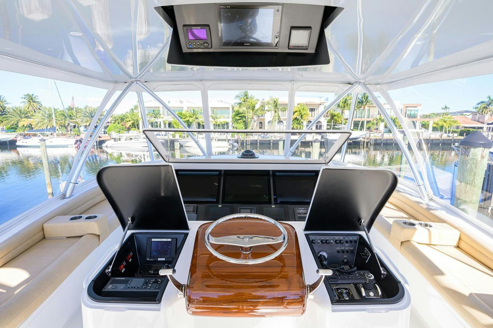 a table with electronic devices on it aboard TORO Yacht for Sale
