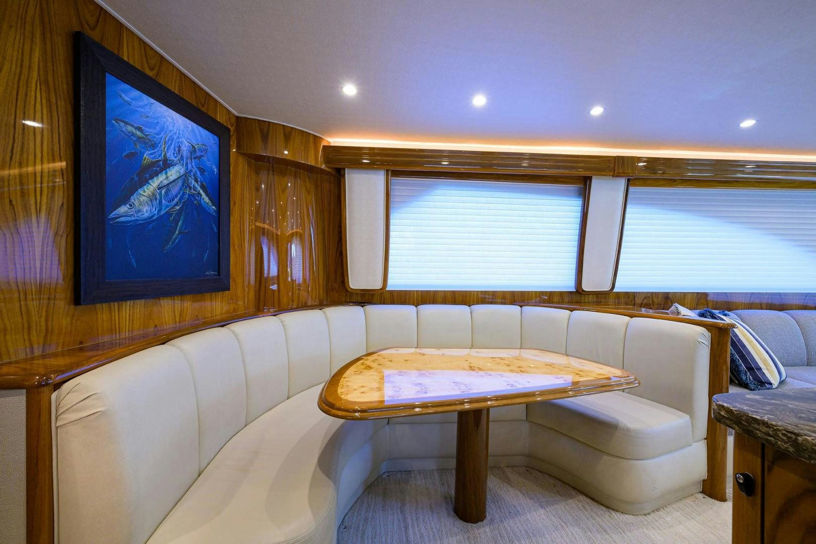 a room with a couch and a table aboard TORO Yacht for Sale