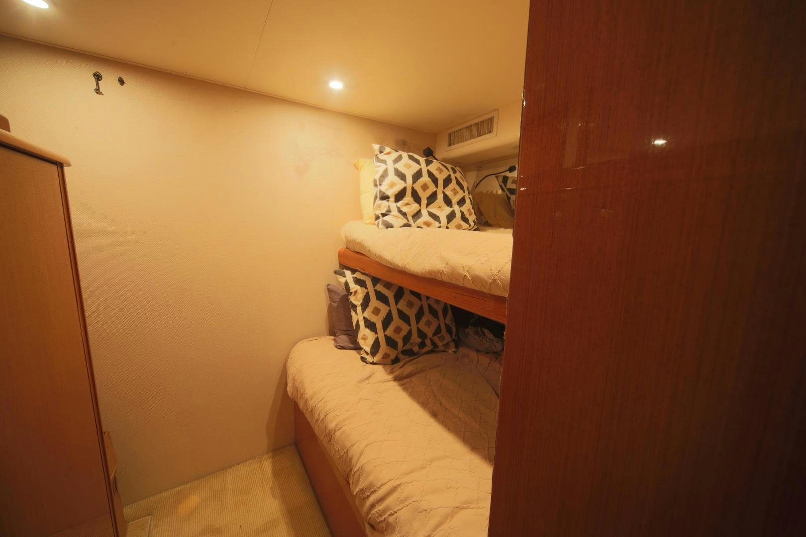 a room with two beds aboard LUCILLE Yacht for Sale