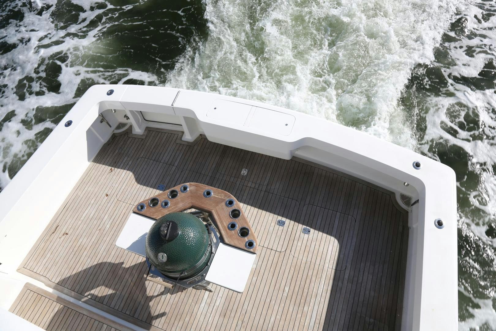 a white and black boat on water aboard LUCILLE Yacht for Sale