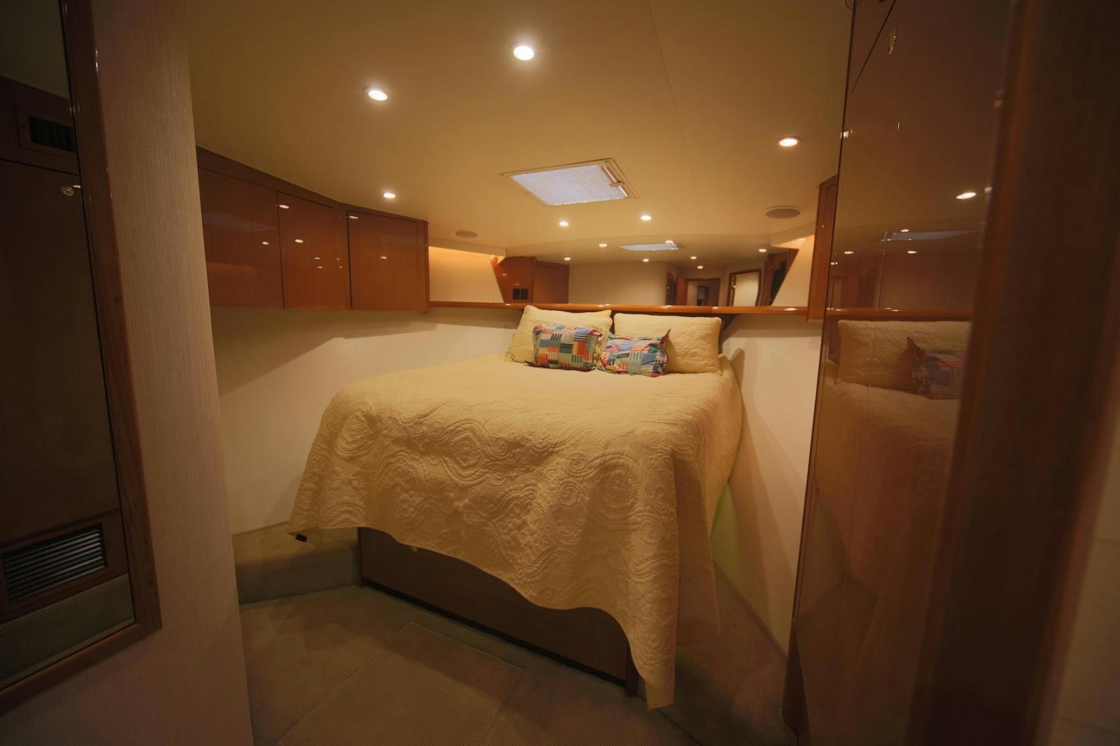 a bed in a room aboard LUCILLE Yacht for Sale
