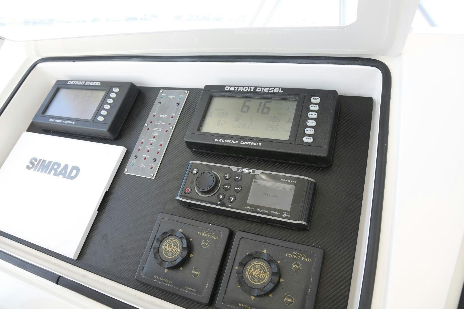 a group of electronic devices aboard LUCILLE Yacht for Sale