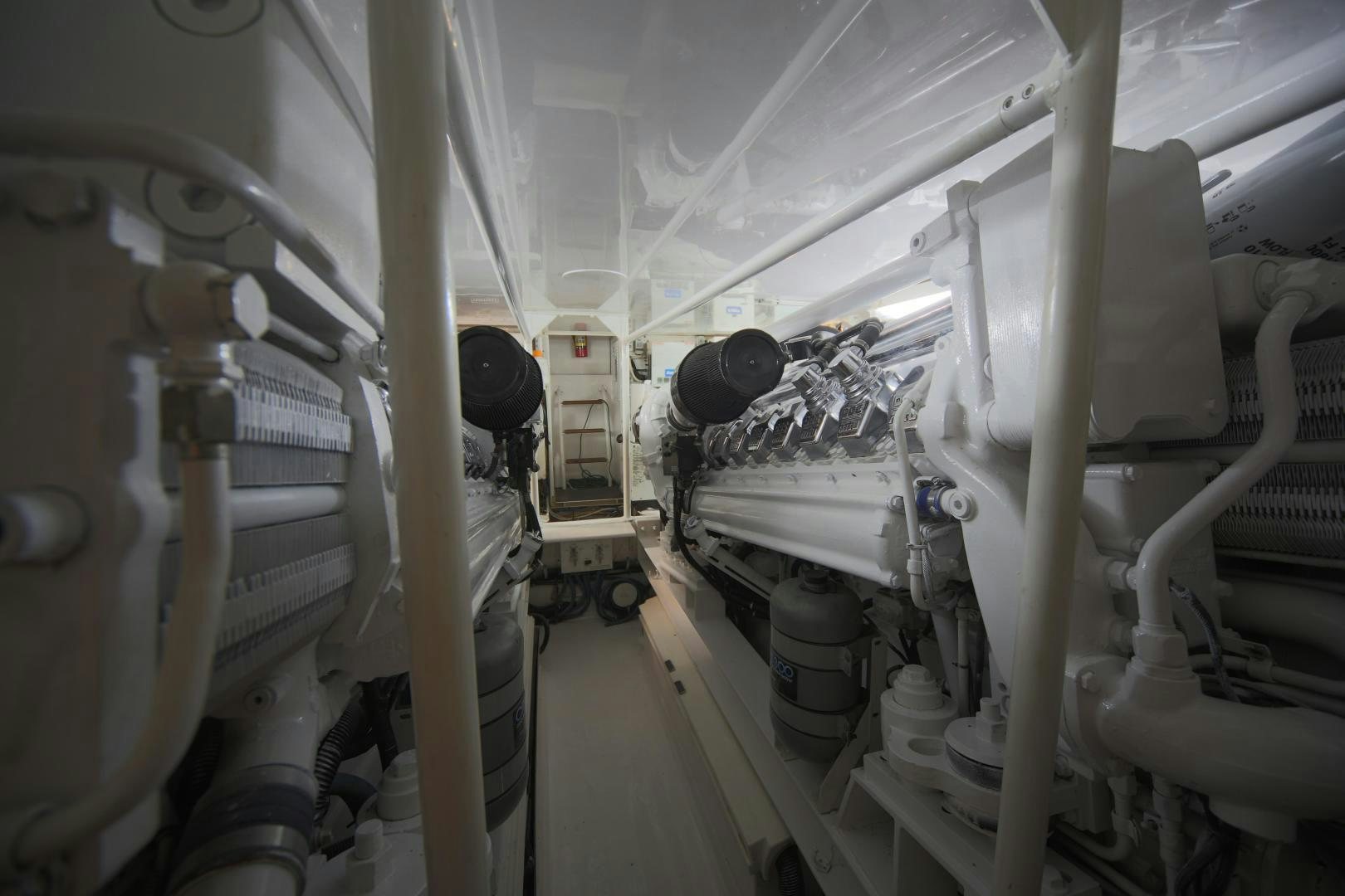 a large room with pipes aboard LUCILLE Yacht for Sale