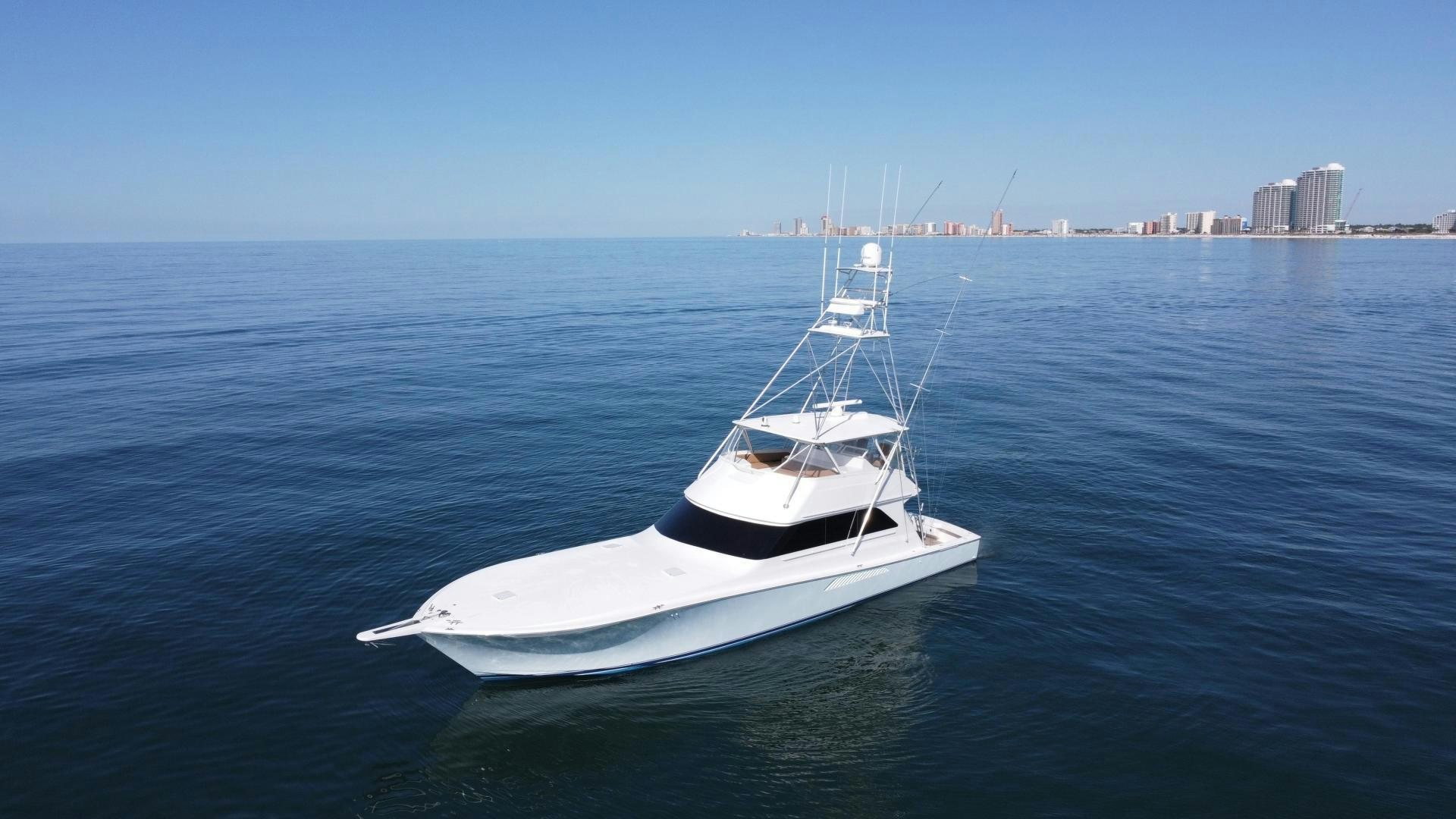 a white boat in the water aboard LUCILLE Yacht for Sale