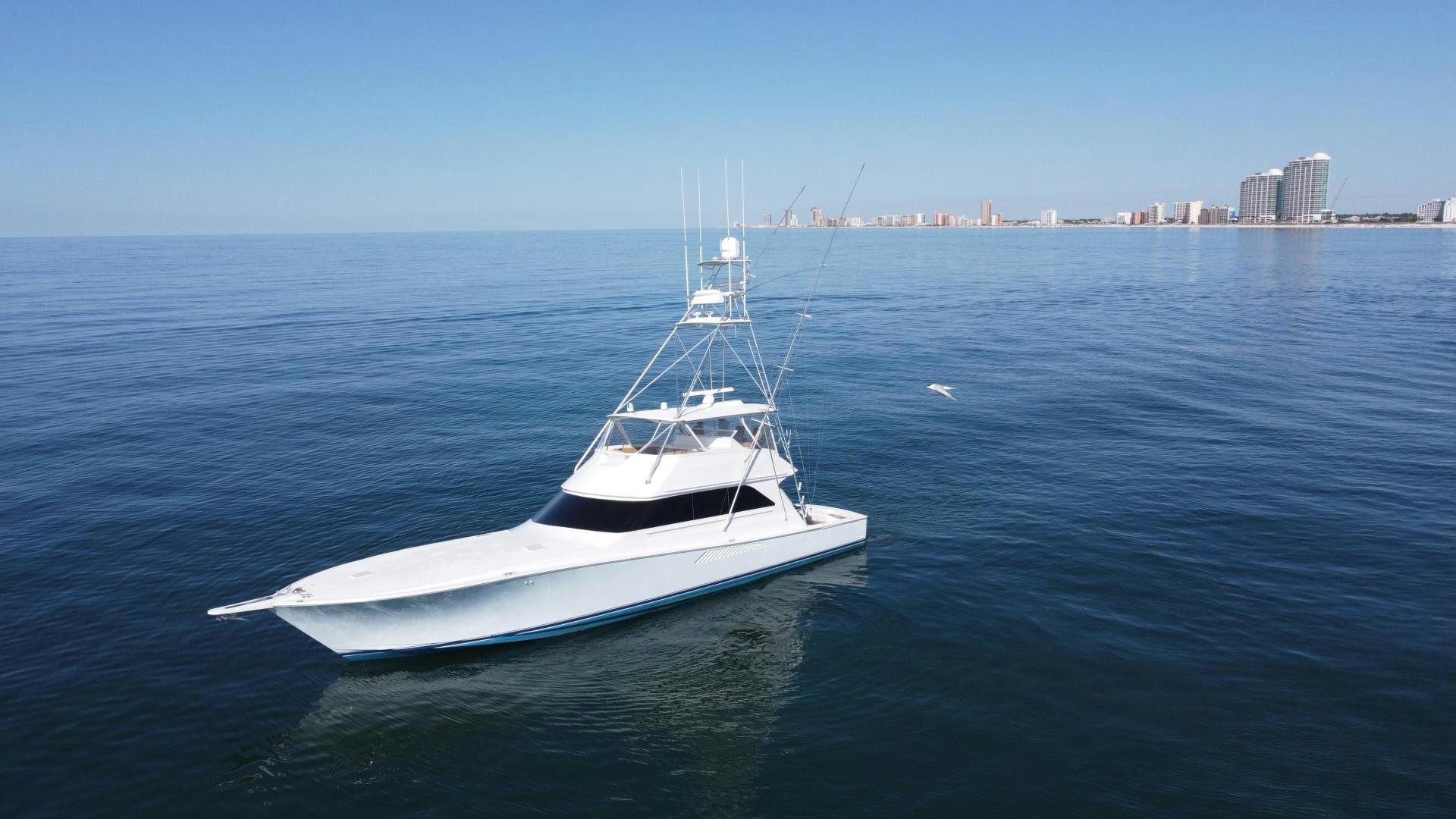 a white boat in the water aboard LUCILLE Yacht for Sale