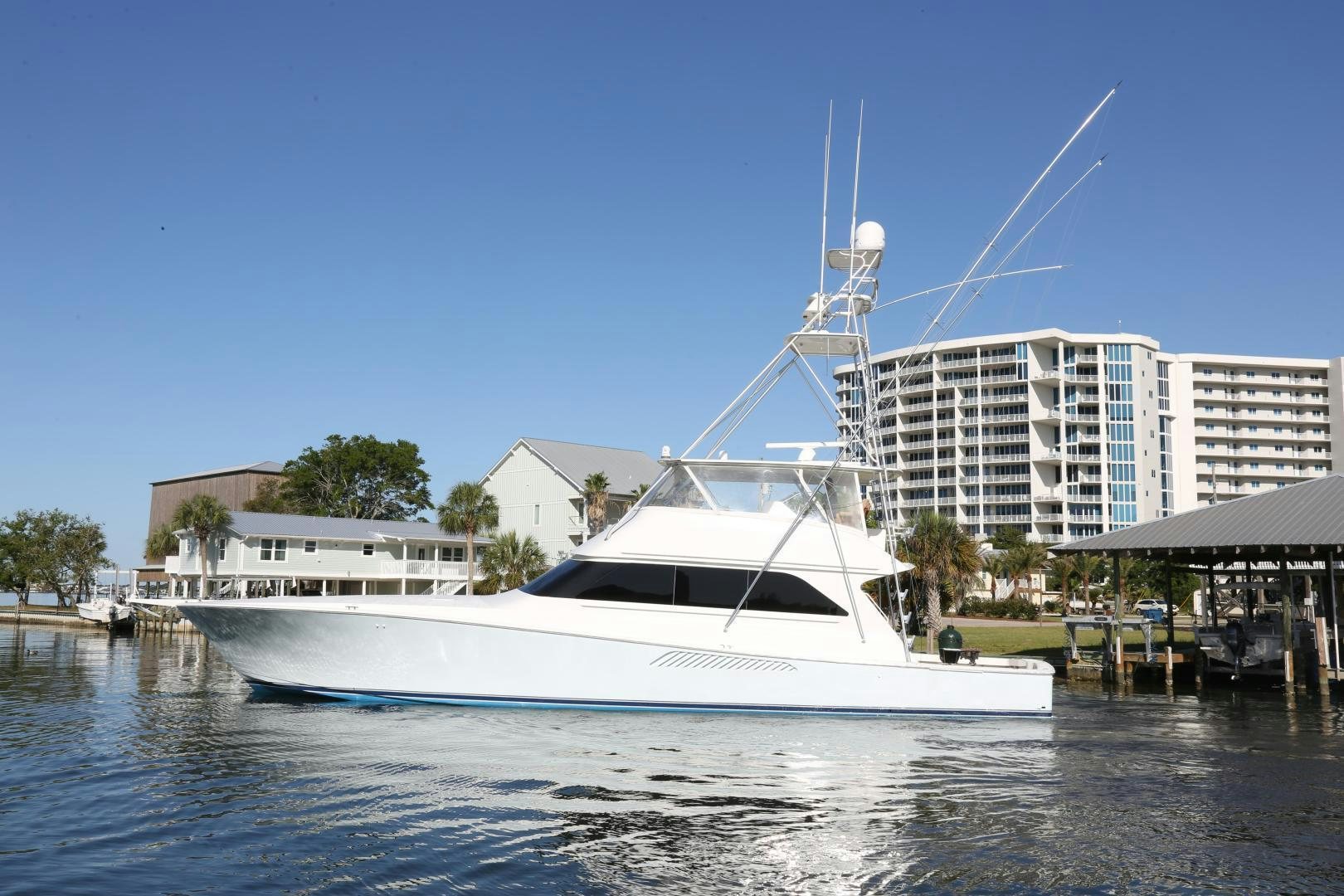 a white boat in a body of water aboard LUCILLE Yacht for Sale