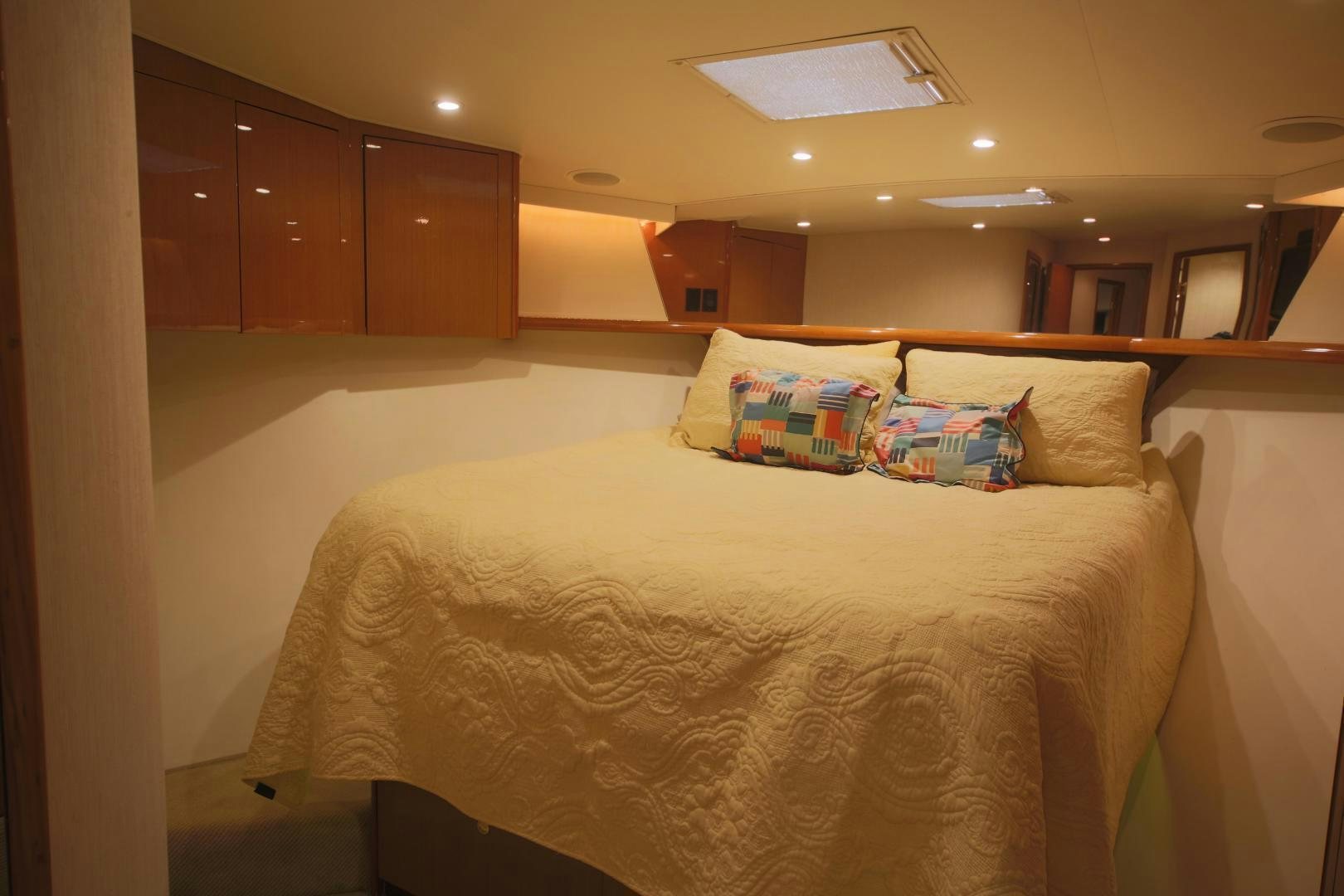 a bed with pillows aboard LUCILLE Yacht for Sale