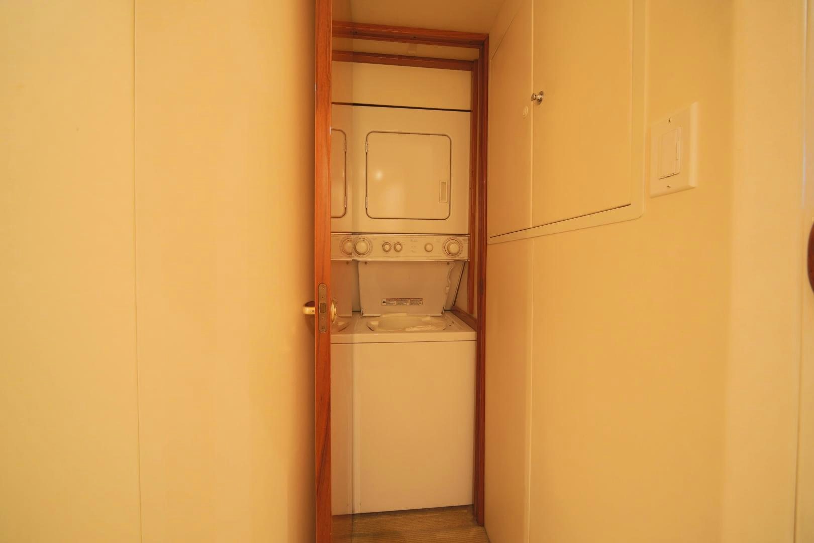 a white refrigerator in a kitchen aboard LUCILLE Yacht for Sale