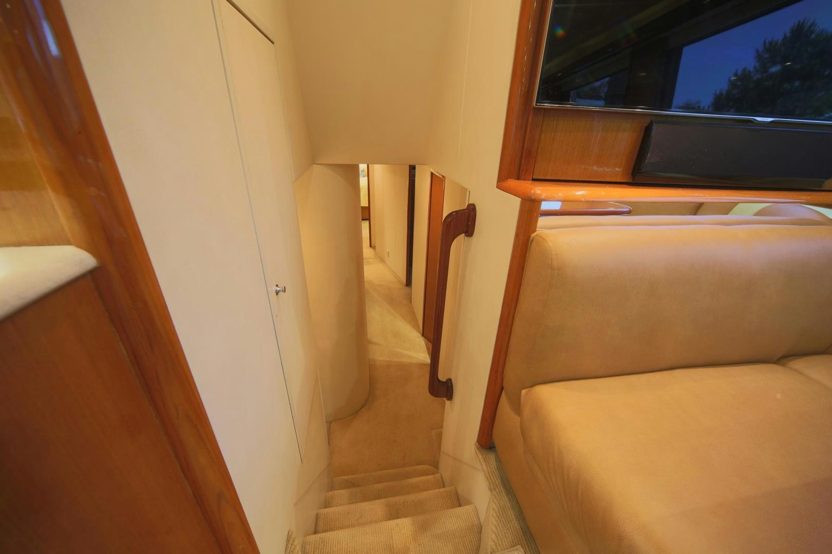 a staircase leading to a window aboard LUCILLE Yacht for Sale