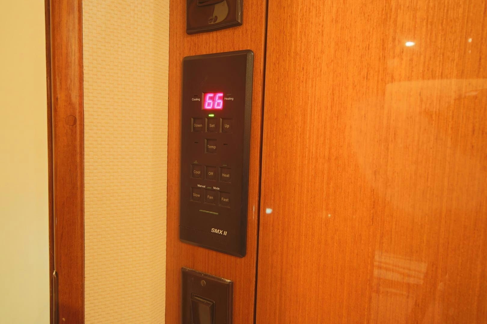 a black elevator control aboard LUCILLE Yacht for Sale