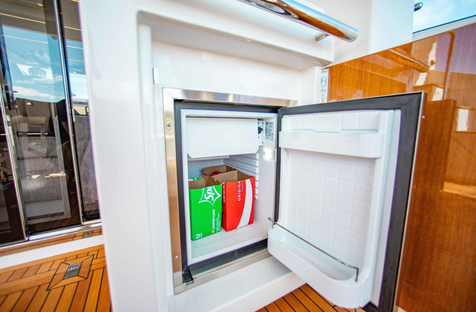 a white box with a red lid and a white box inside of it aboard Queen Mara Yacht for Sale