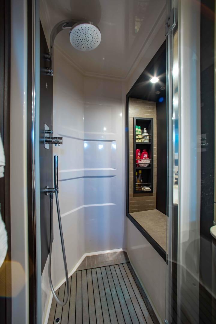 a shower unit in a bathroom aboard Queen Mara Yacht for Sale