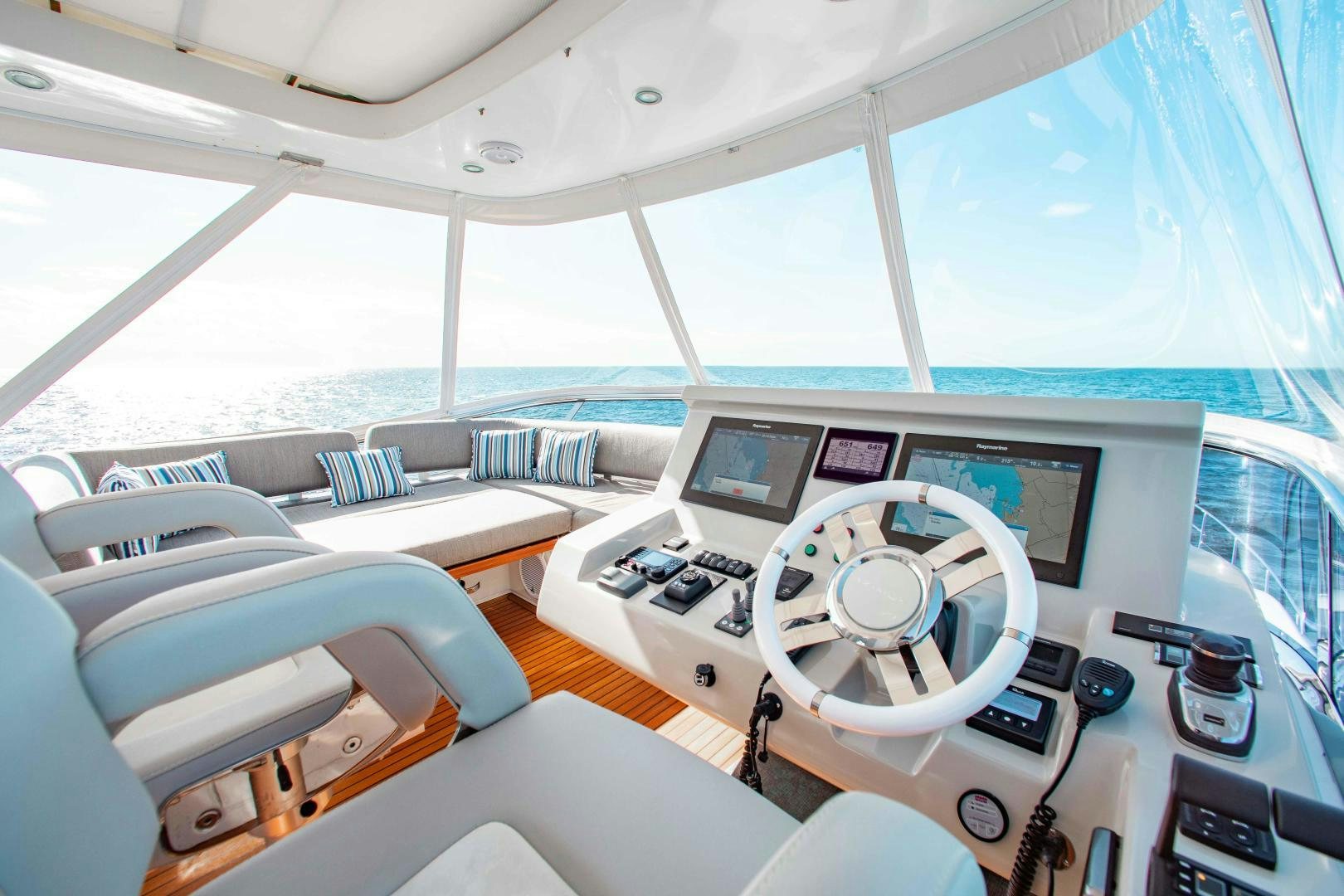 inside of a white tent aboard Queen Mara Yacht for Sale