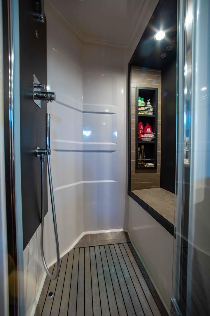 a shower unit in a bathroom aboard Queen Mara Yacht for Sale