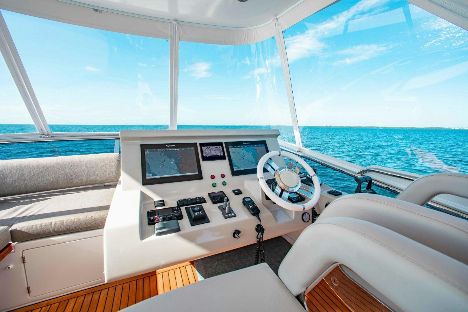 a boat with a view of the ocean and the ocean aboard Queen Mara Yacht for Sale