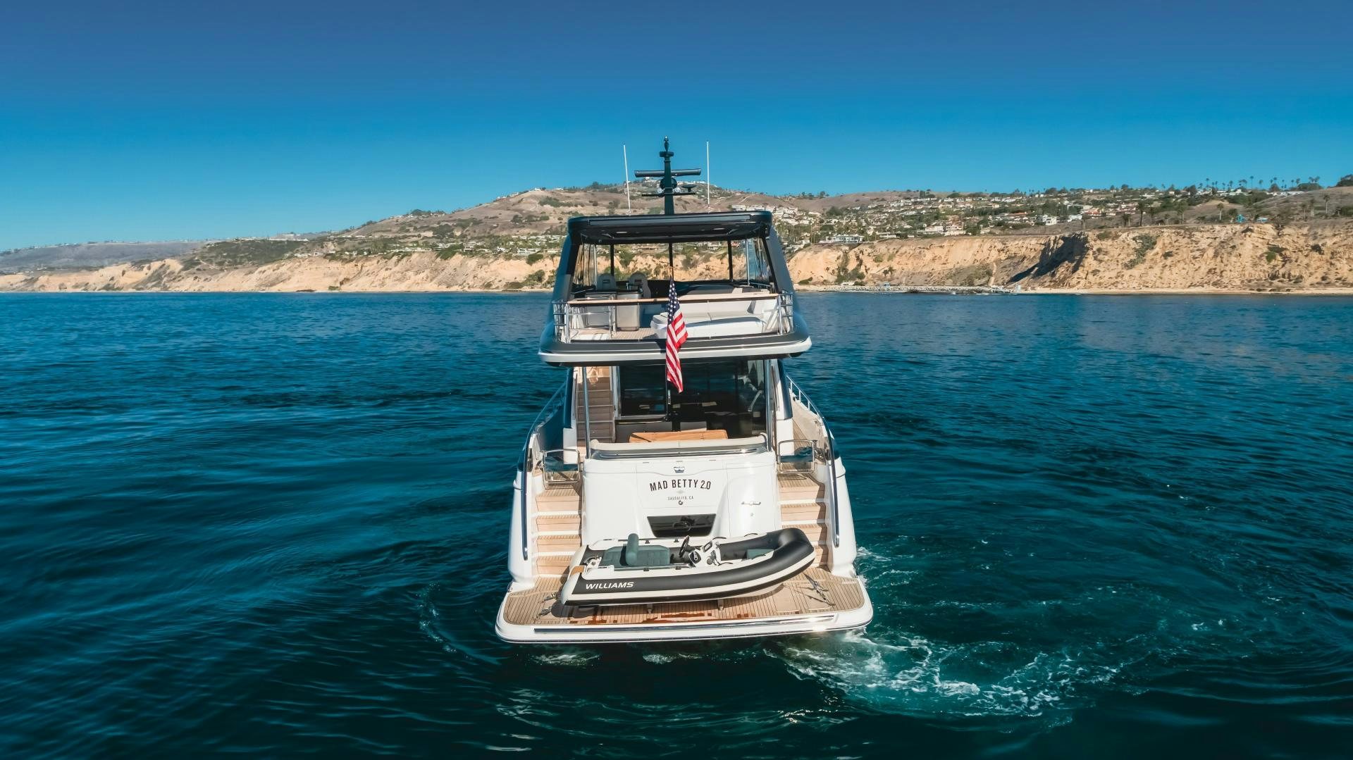 a boat on the water aboard Mad Betty 2.0 Yacht for Sale