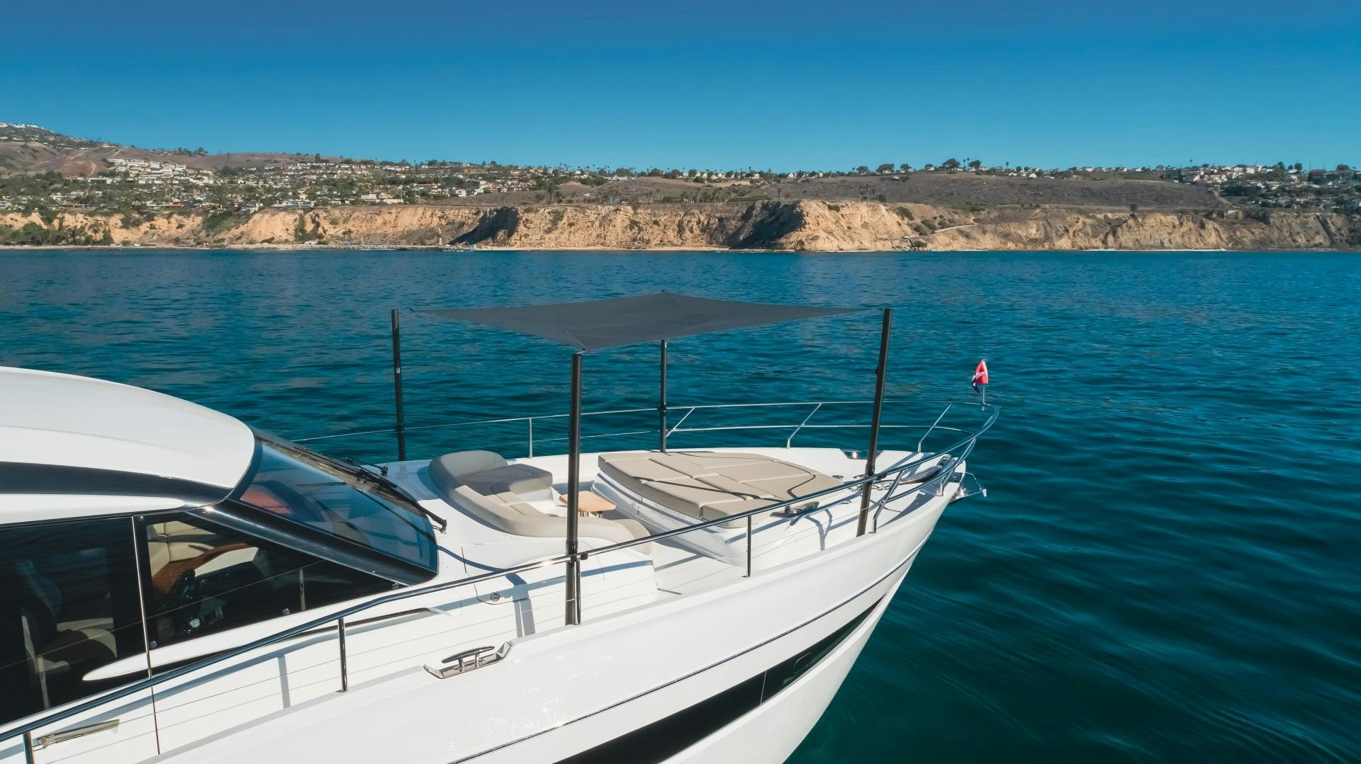 a boat on the water aboard Mad Betty 2.0 Yacht for Sale