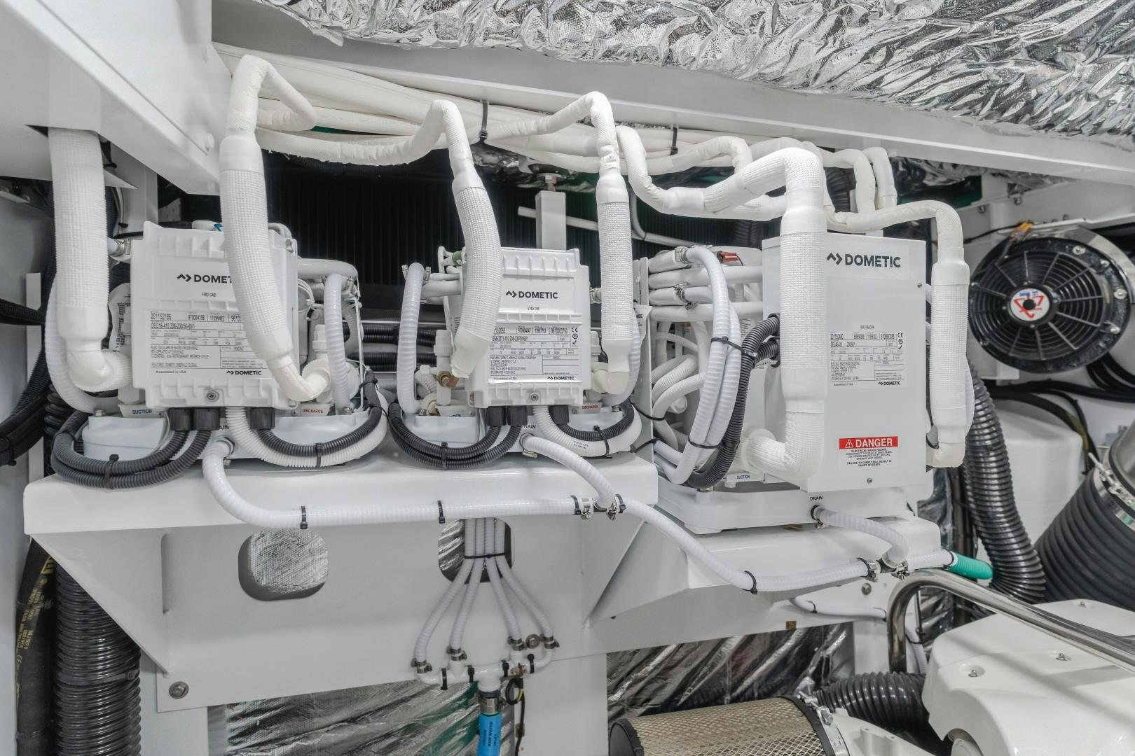 a close-up of a white machine aboard Mad Betty 2.0 Yacht for Sale