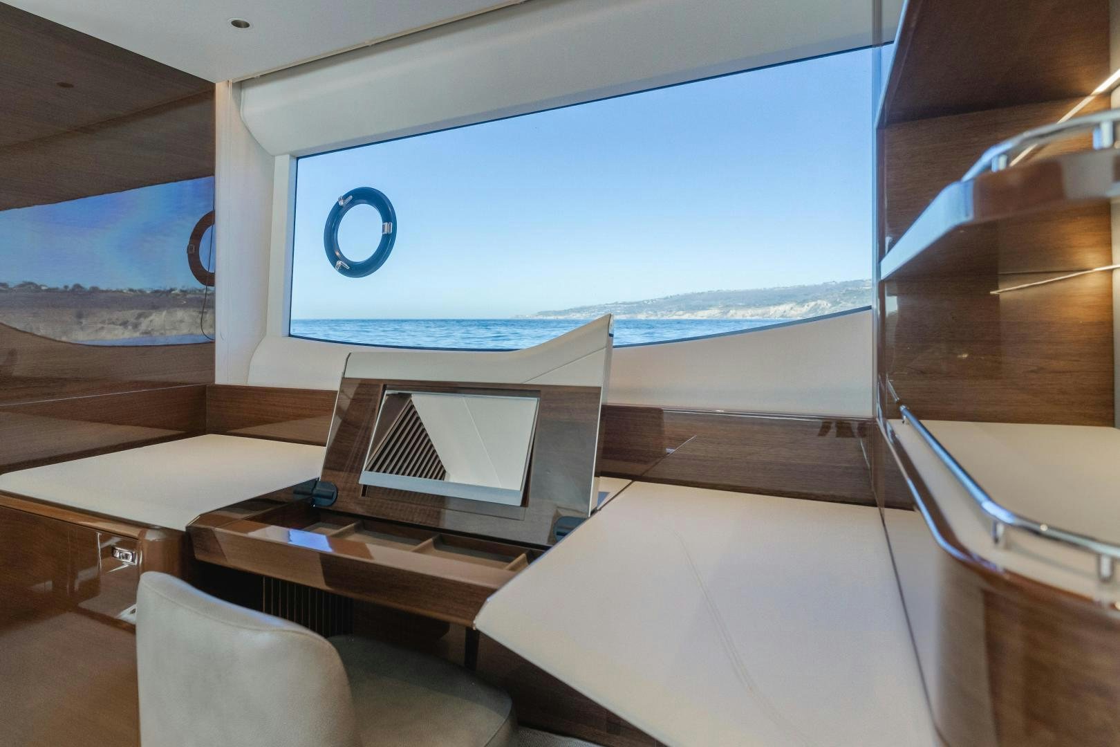 a room with a large screen aboard Mad Betty 2.0 Yacht for Sale
