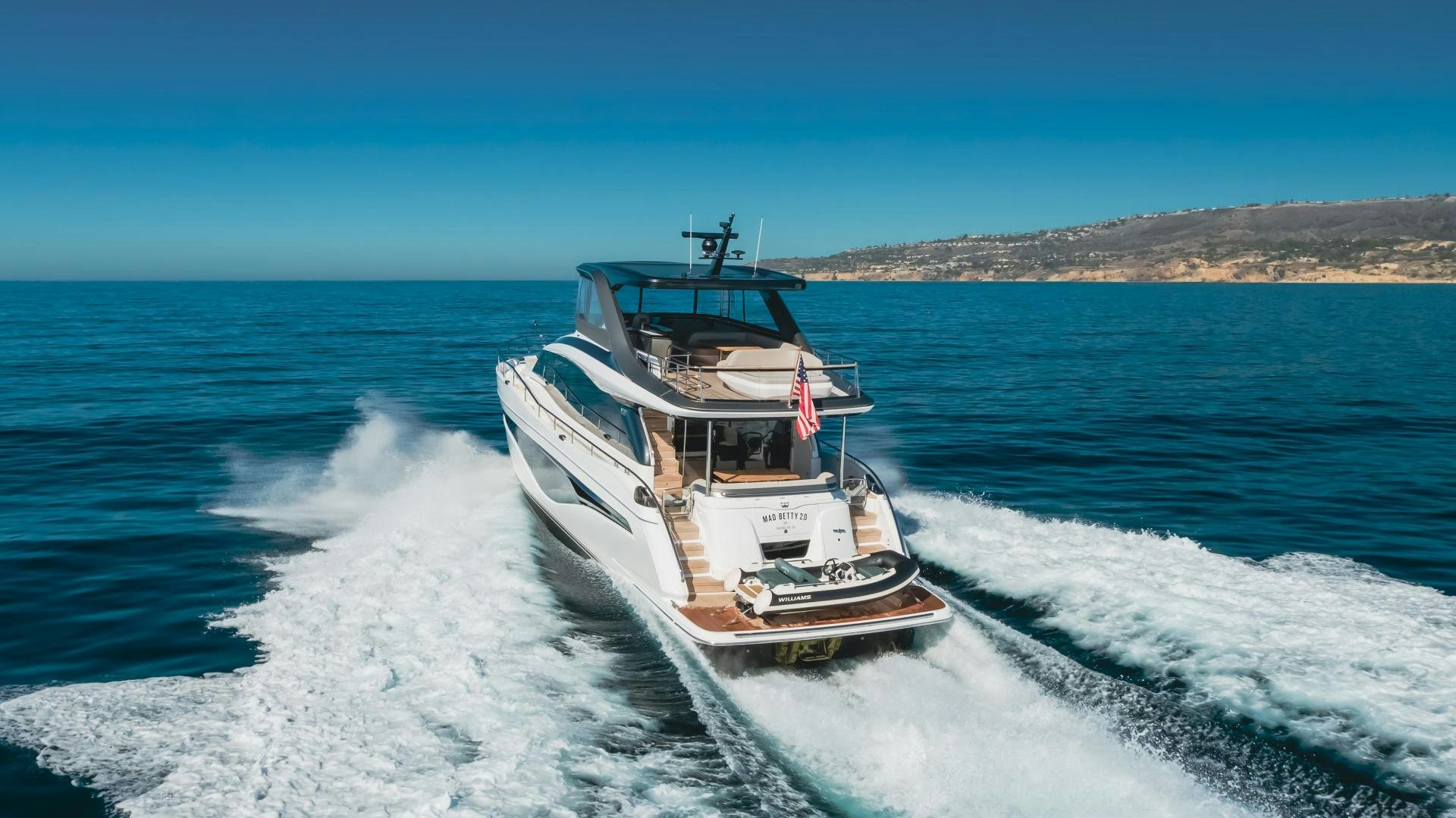 a boat on the water aboard Mad Betty 2.0 Yacht for Sale