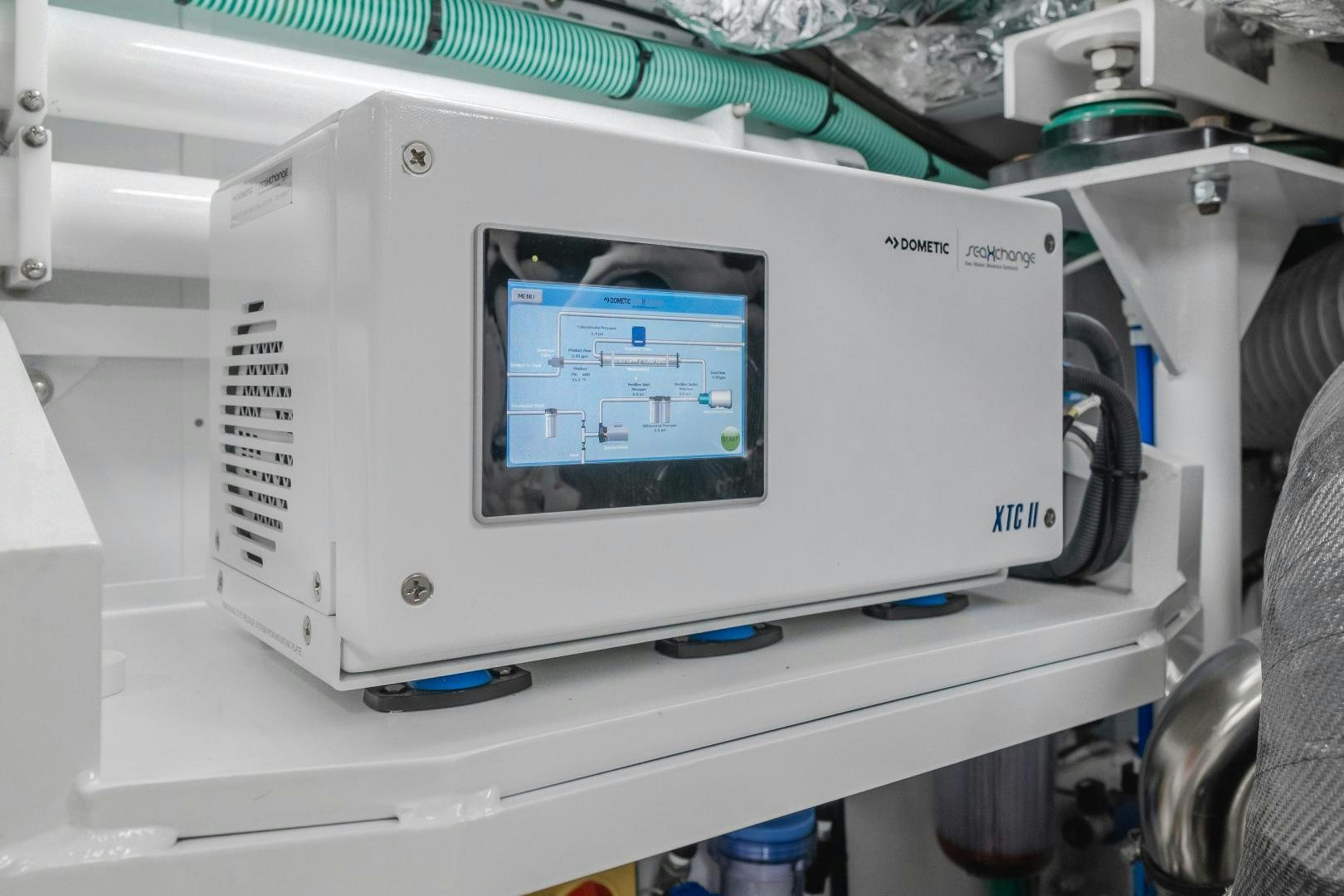 a white machine with a screen aboard Mad Betty 2.0 Yacht for Sale