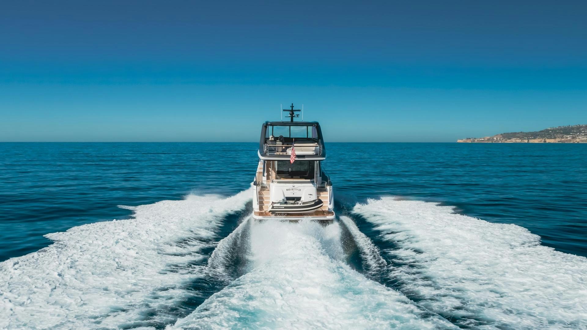 a boat on the water aboard Mad Betty 2.0 Yacht for Sale