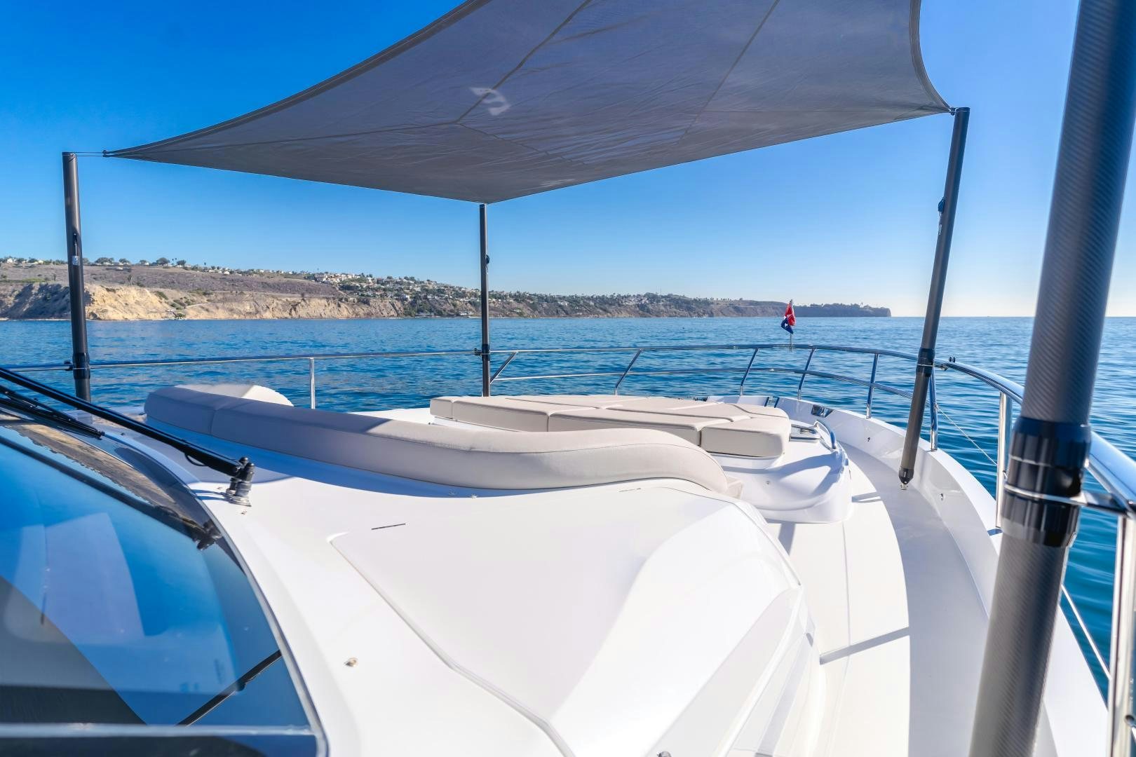 a boat on the water aboard Mad Betty 2.0 Yacht for Sale