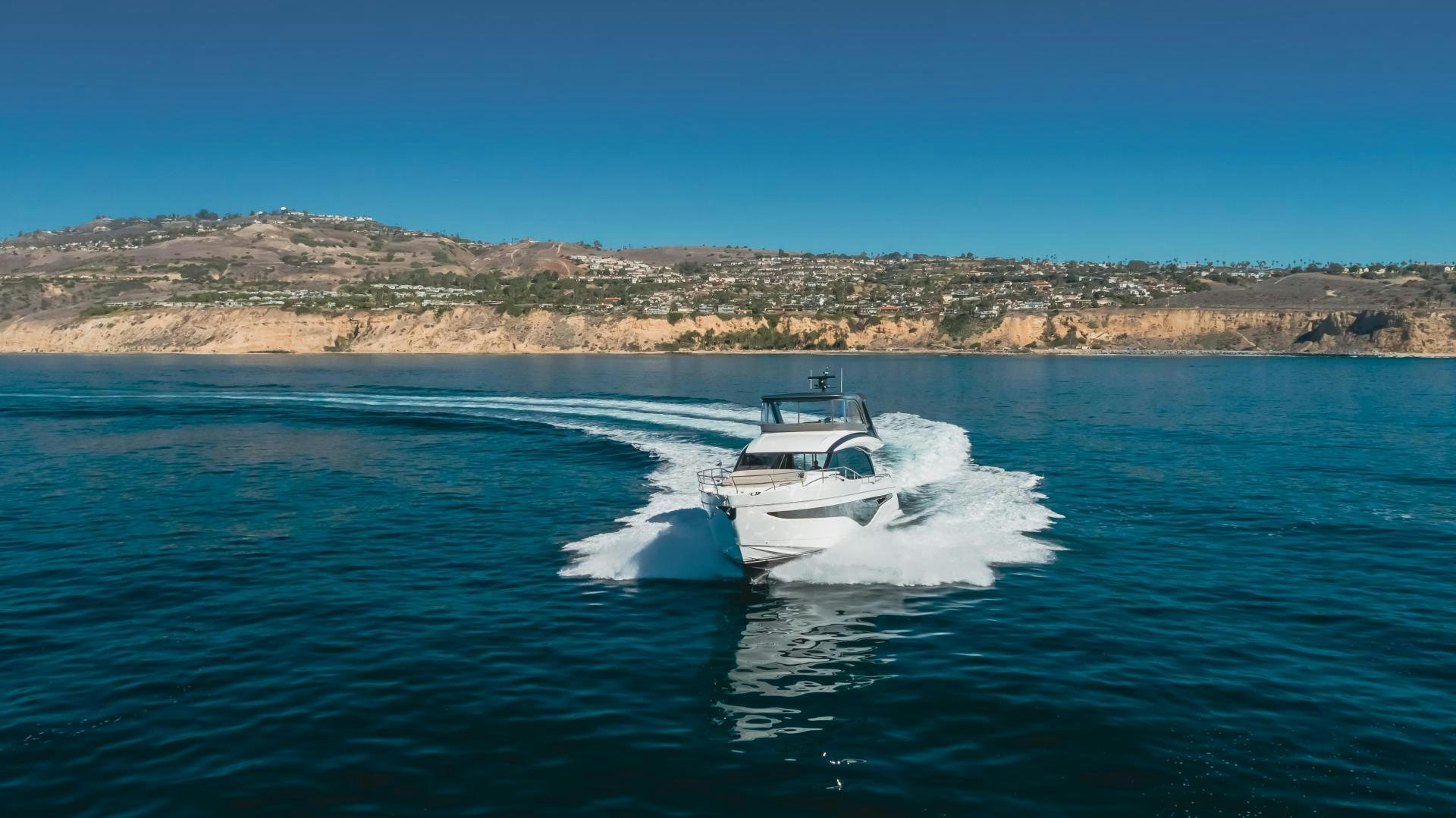 a boat on the water aboard Mad Betty 2.0 Yacht for Sale