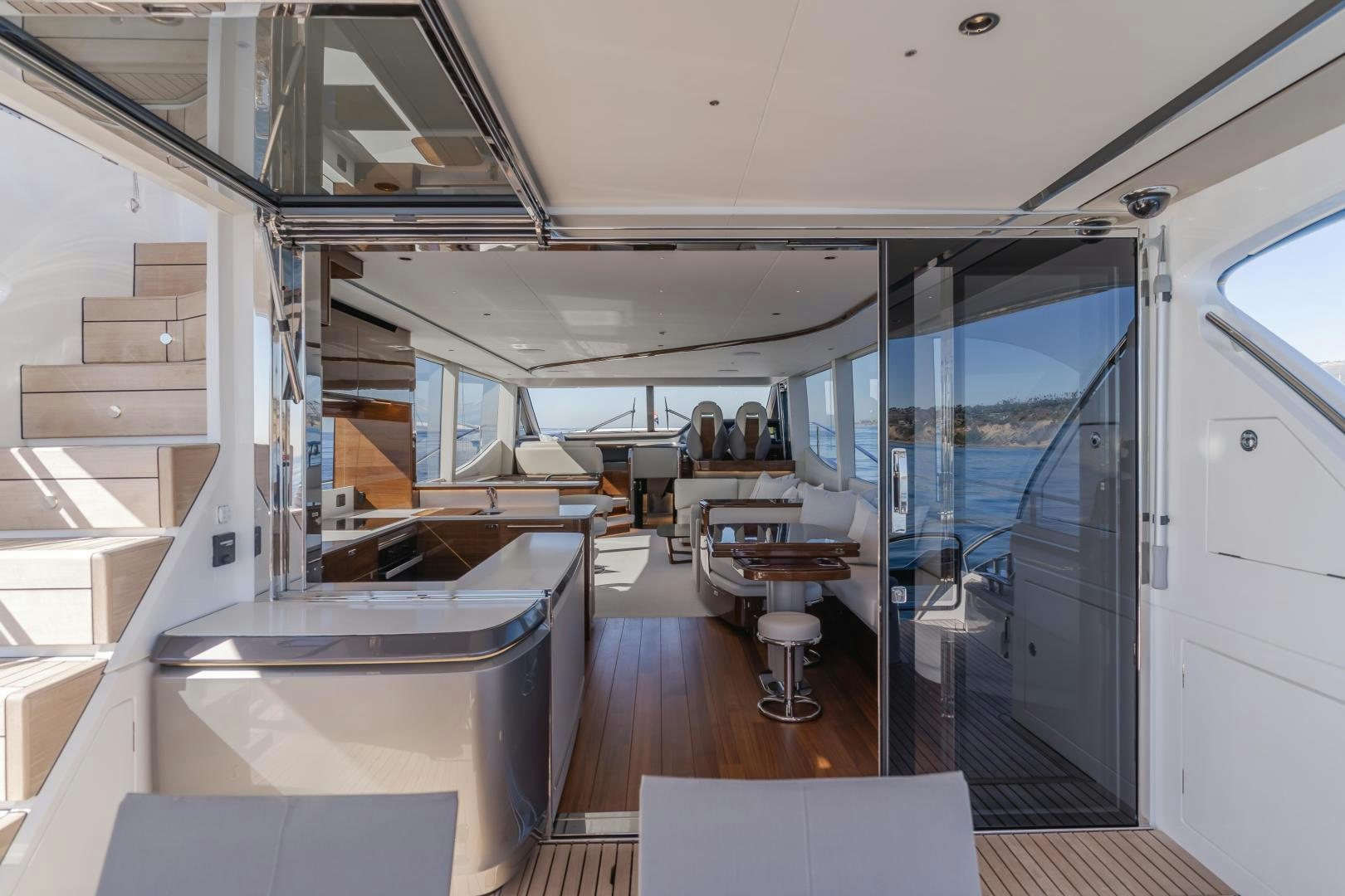 a room with a large glass door aboard Mad Betty 2.0 Yacht for Sale