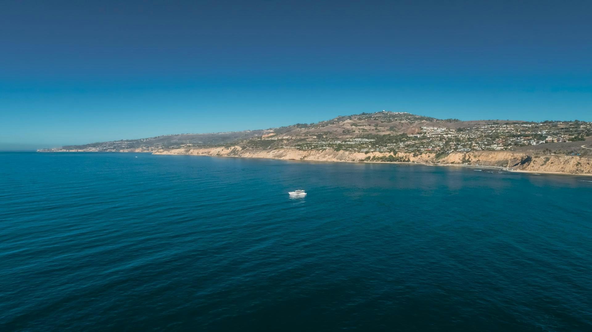 a body of water with land in the distance aboard Mad Betty 2.0 Yacht for Sale