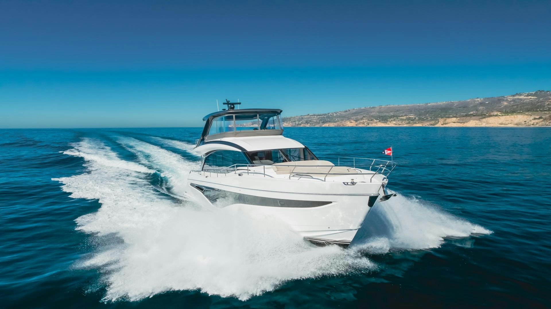 a boat on the water aboard Mad Betty 2.0 Yacht for Sale