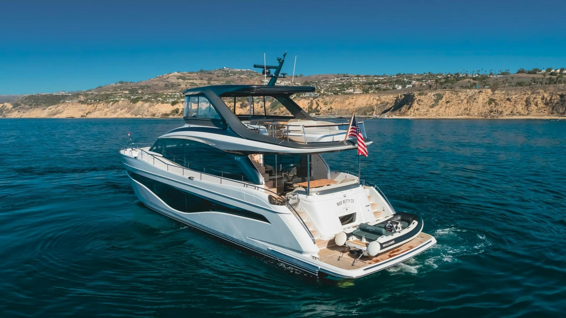 a boat on the water aboard Mad Betty 2.0 Yacht for Sale