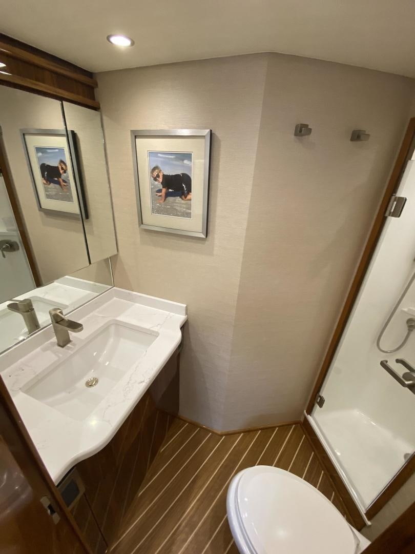 a bathroom with a sink and a toilet aboard Make It Happen Yacht for Sale