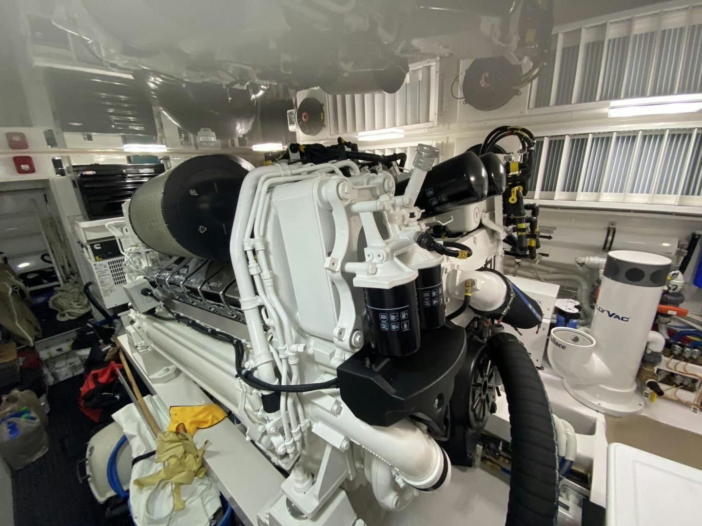 a car with a large engine aboard Make It Happen Yacht for Sale