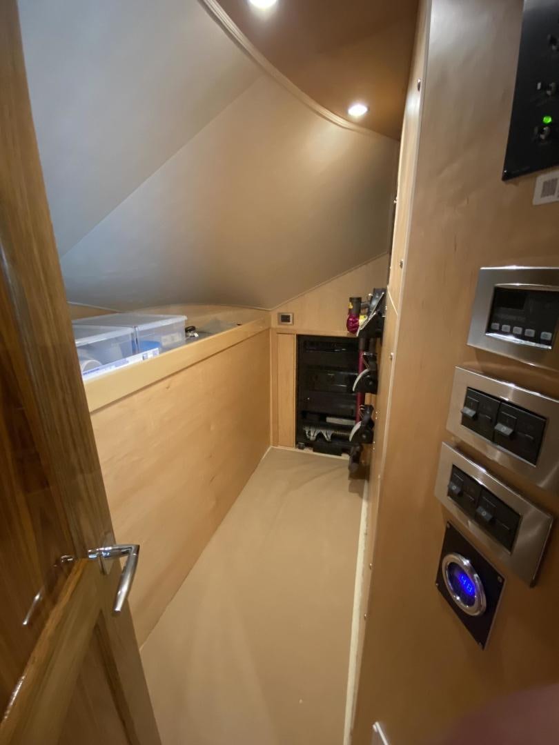 a kitchen with a microwave oven and a stove aboard Make It Happen Yacht for Sale