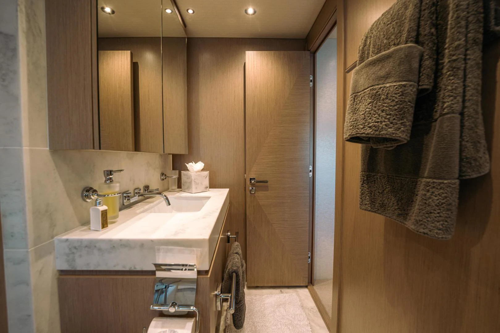 a bathroom with a towel on the wall aboard EOS Yacht for Sale