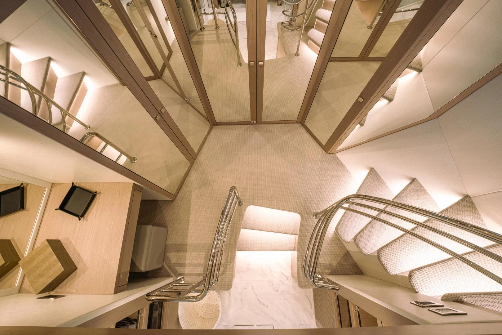 a room with a bed and a television on the wall aboard EOS Yacht for Sale