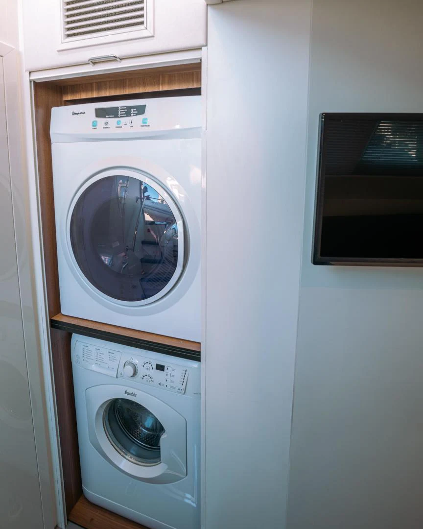 a white washing machine aboard EOS Yacht for Sale