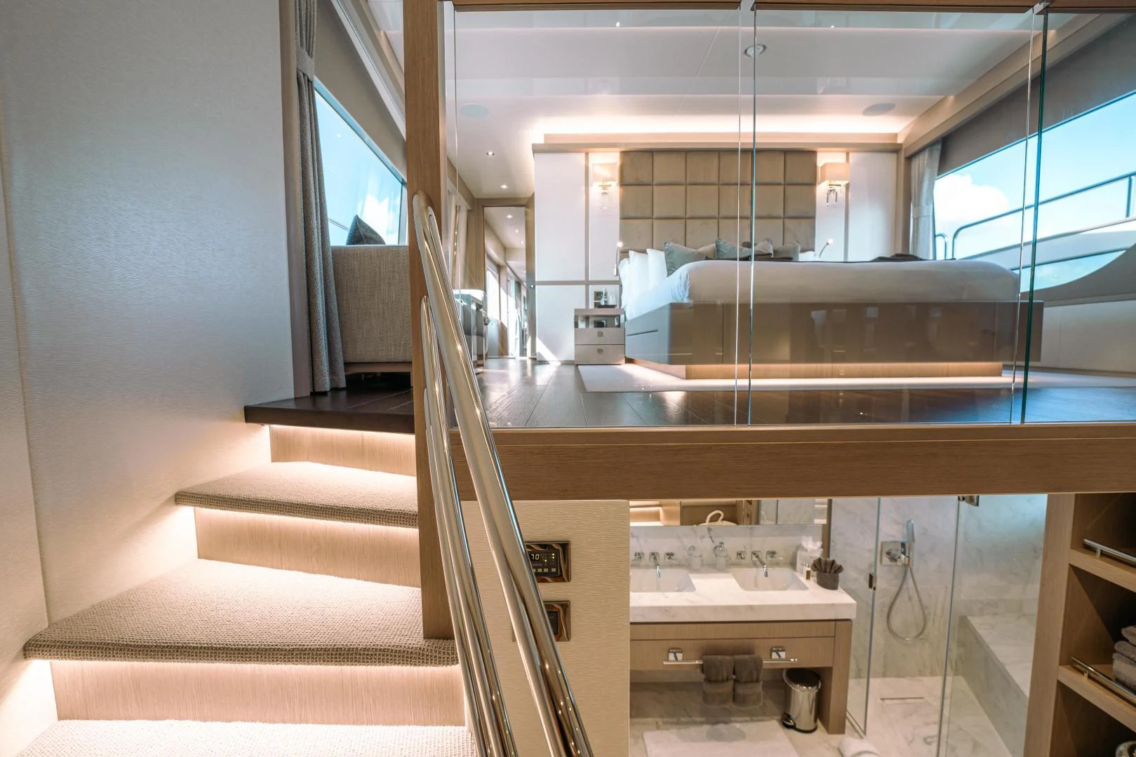 a large bathroom with a glass shower aboard EOS Yacht for Sale