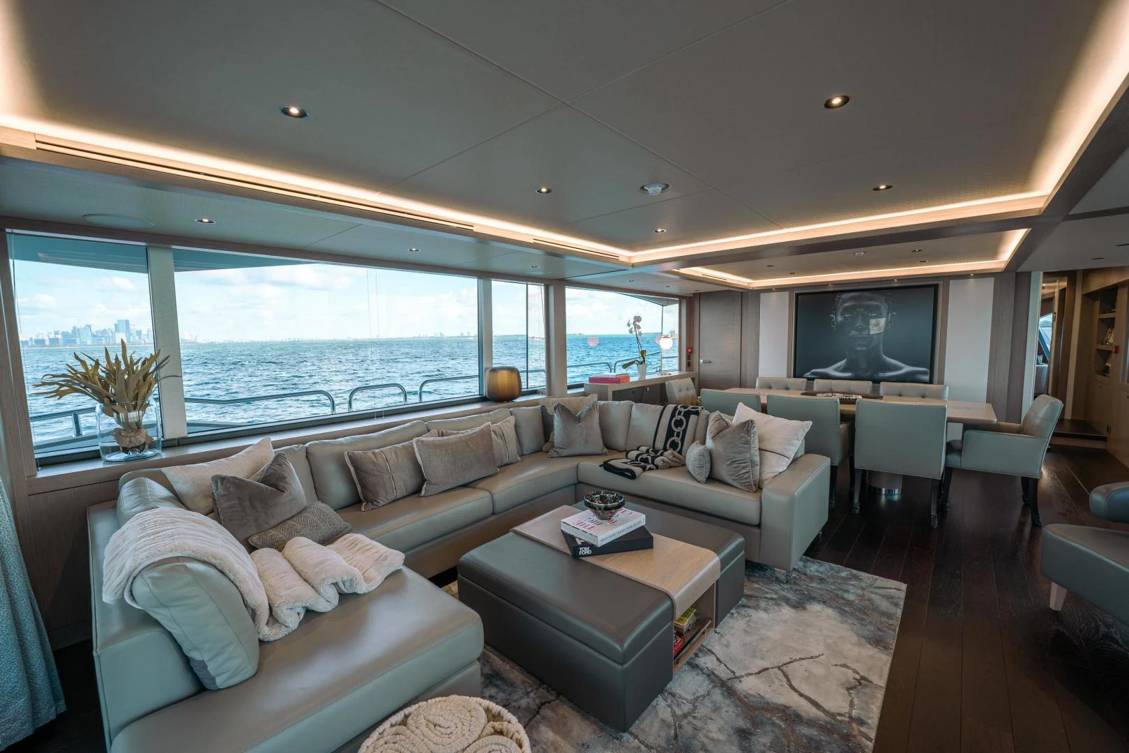 a living room with a large window aboard EOS Yacht for Sale