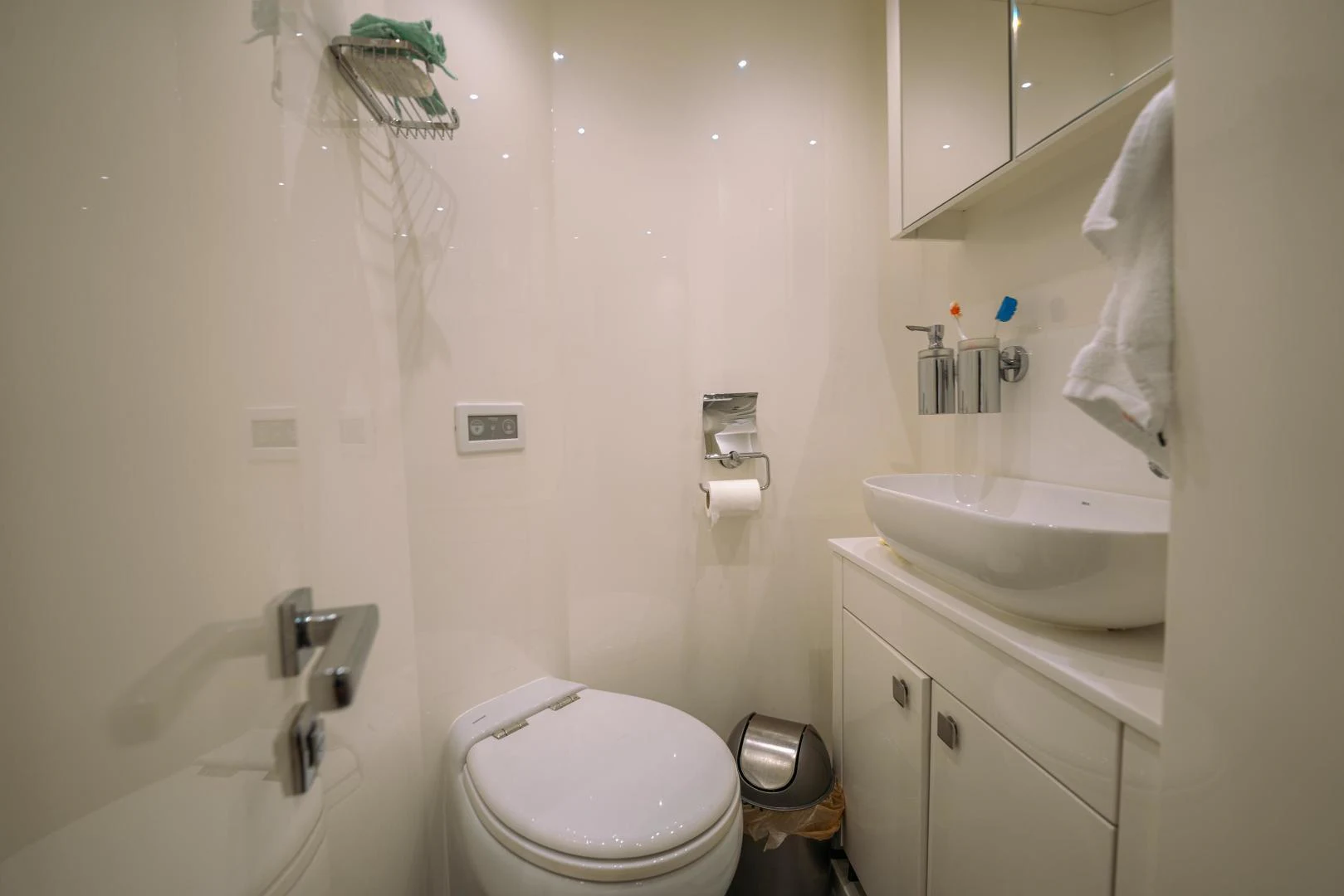 a bathroom with a toilet and sink aboard EOS Yacht for Sale
