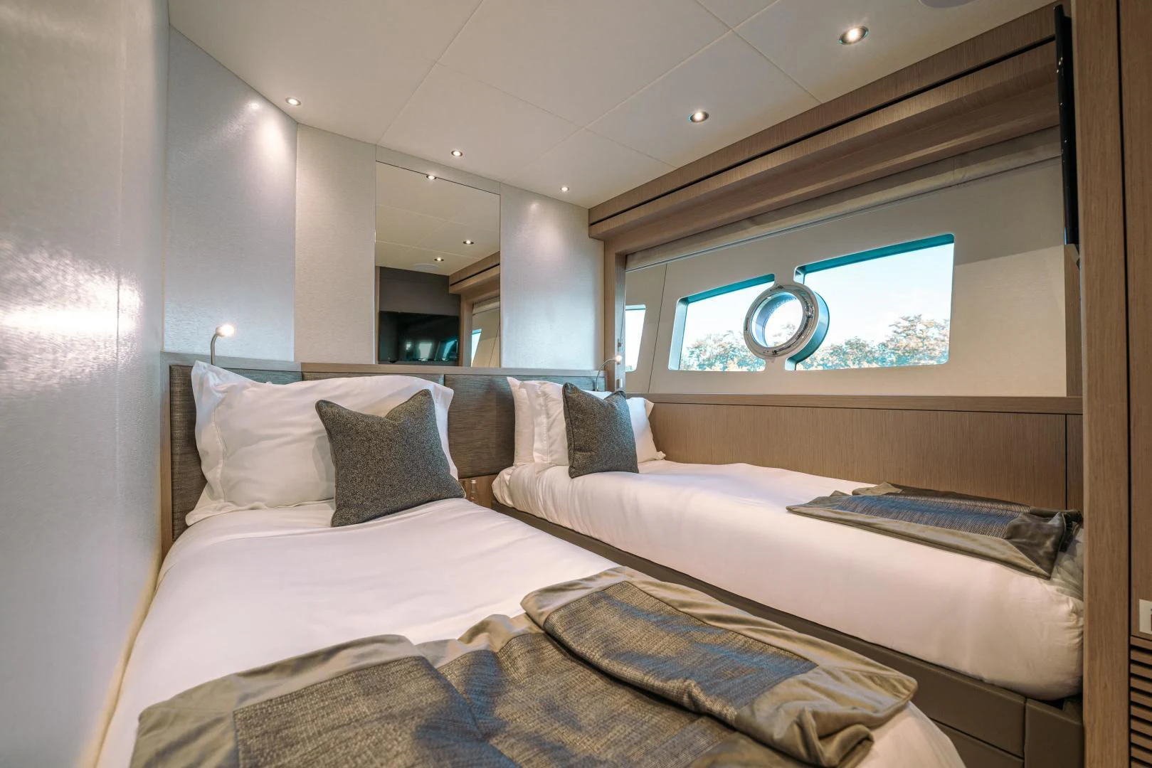 a room with two beds aboard EOS Yacht for Sale
